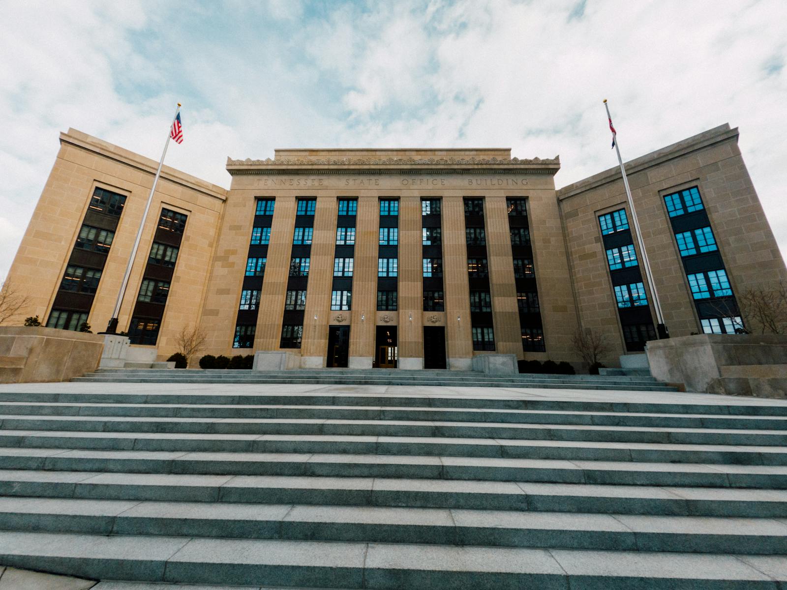 Fed building facade against stairs in city